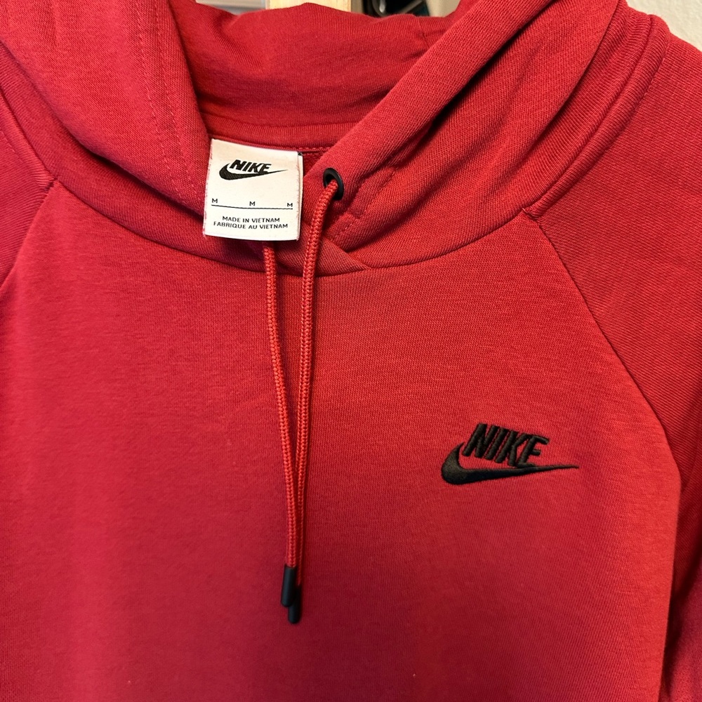 Red Nike Sweatshirt. Men’s: M. women’s: L